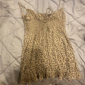 cheetah print dress with a small tie by the chest